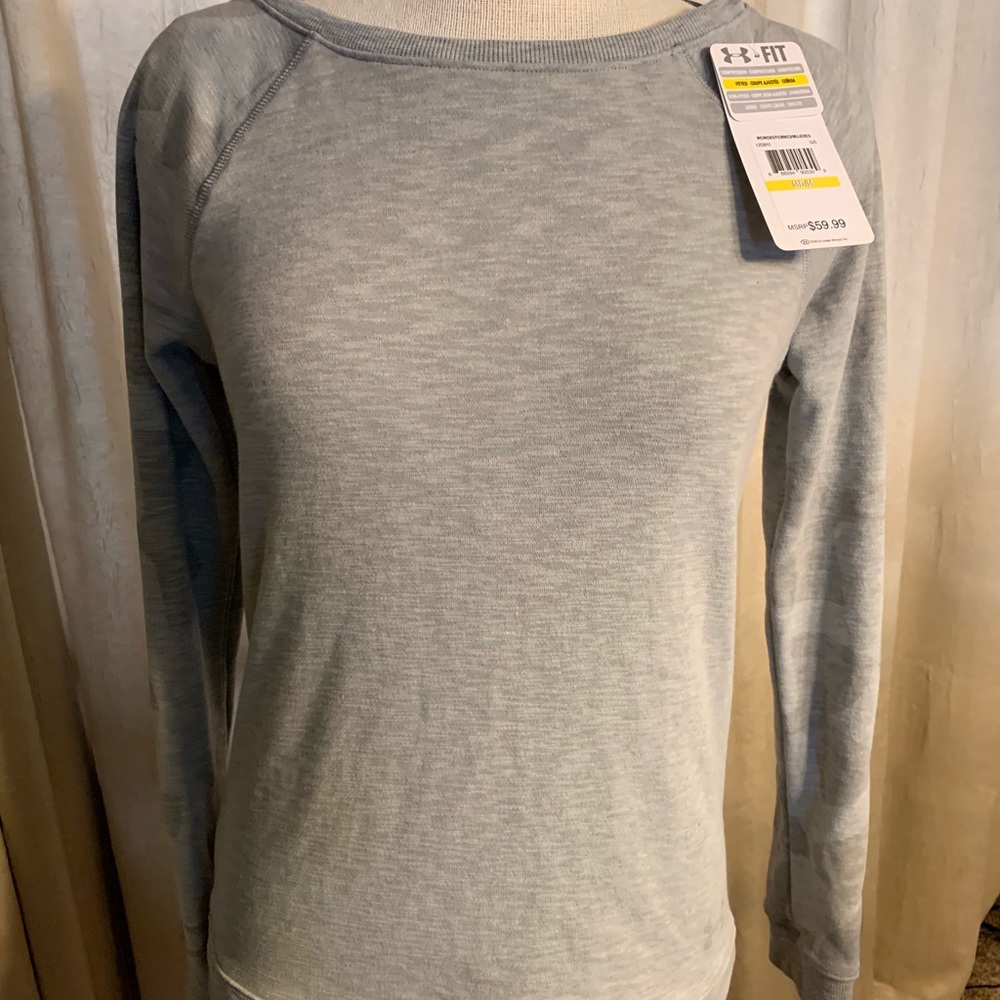Women’s Under Armour sweat shirt.